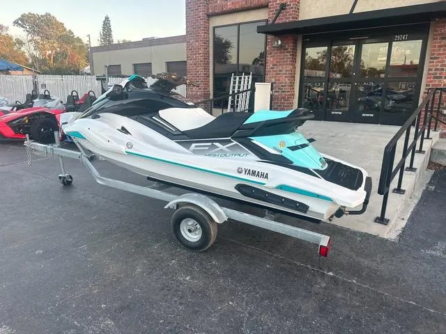 Slide: The Image of 2024 Yamaha Marine Waverunner FX HO in white and black, sleek design detail. - 7