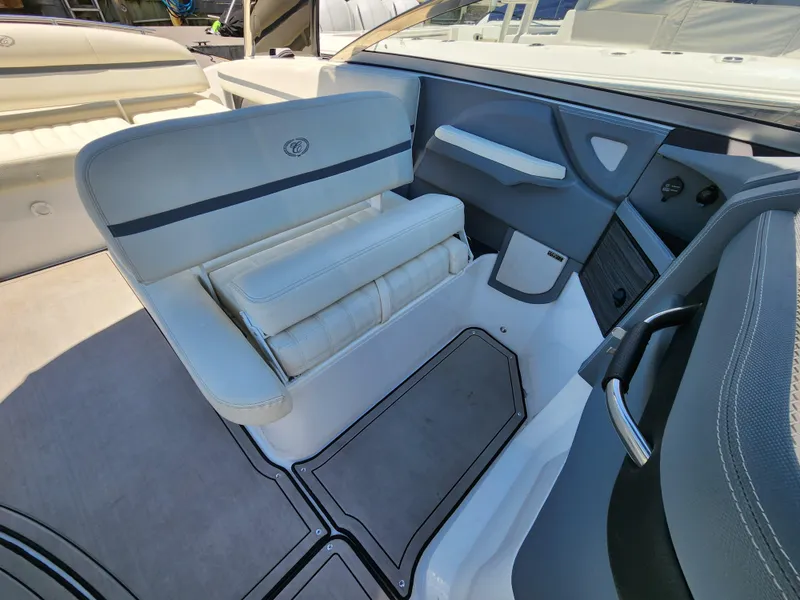 Slide: The Image of 2020 Cobalt R5 boat interior with white and gray seating. - 10