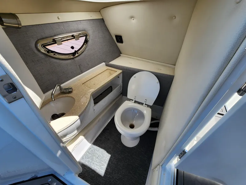 Slide: The Image of 2020 Cobalt R5 boat interior bathroom with sink and toilet. - 11