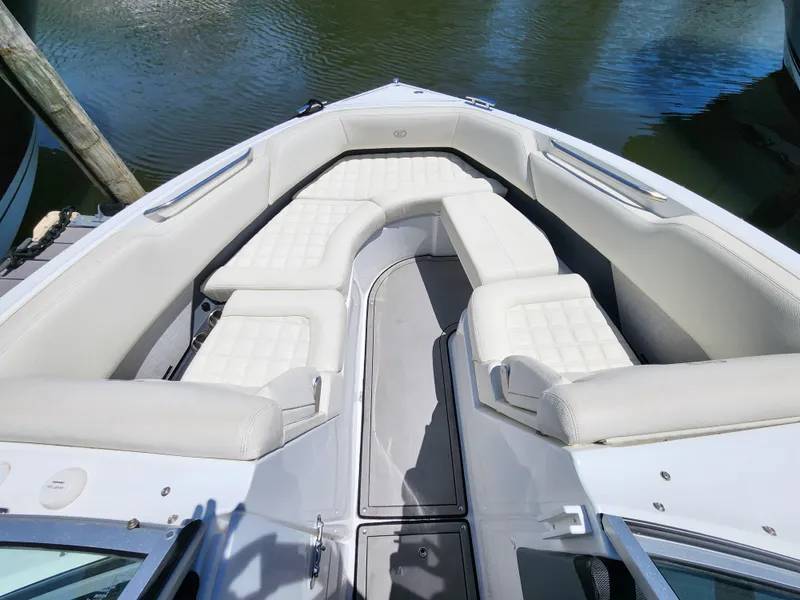 Slide: The Image of 2020 Cobalt R5 boat with white cushioned seating in the bow area. - 12