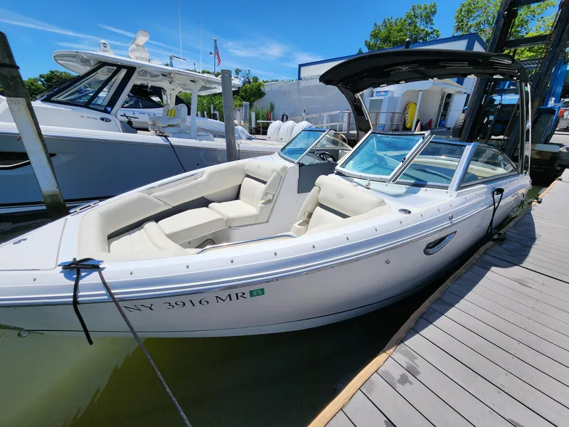 Slide: The Image of 2020 Cobalt R5 boat docked at marina on a sunny day. - 3