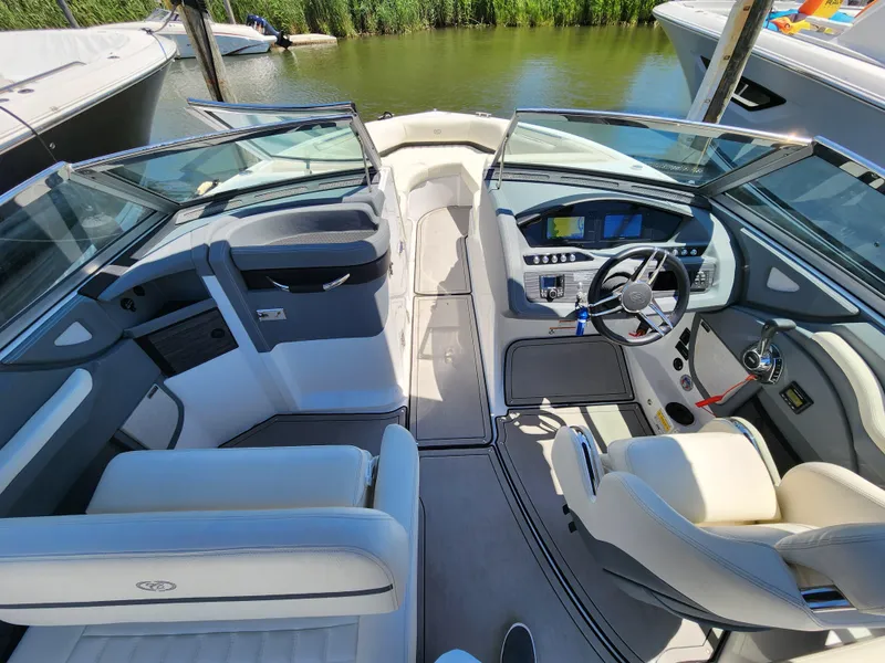 Slide: The Image of 2020 Cobalt R5 boat interior with modern dashboard and seating. - 7
