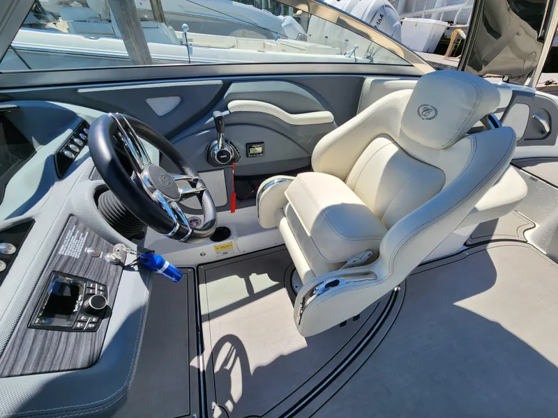 Slide: The Image of 2020 Cobalt R5 boat interior with captain's chair and steering wheel. - 8