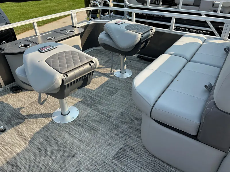 Slide: The Image of 2024 Ranger Reata 220F boat interior with plush seating and modern design. - 8