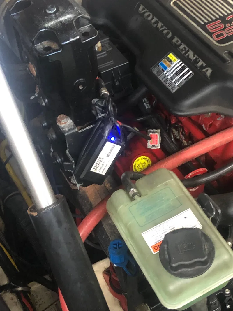 Slide: The Image of Engine compartment of a 2008 Chaparral 330 Signature boat with Volvo Penta components. - 26
