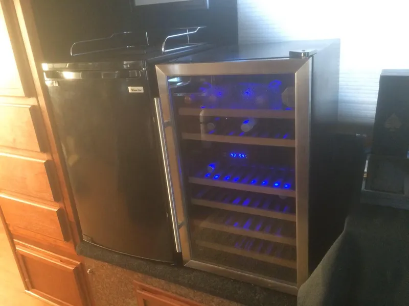 Slide: The Image of Mini fridge and wine cooler on Bluewater 42 Coastal Cruiser, 1985 model. - 13