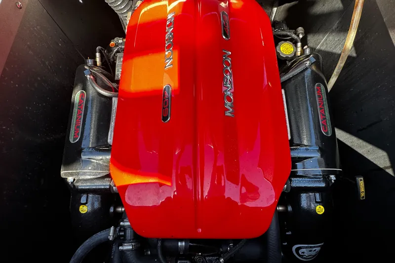 Slide: The Image of Red Monsoon engine in a 2018 Axis A20 boat, showcasing powerful performance. - 33