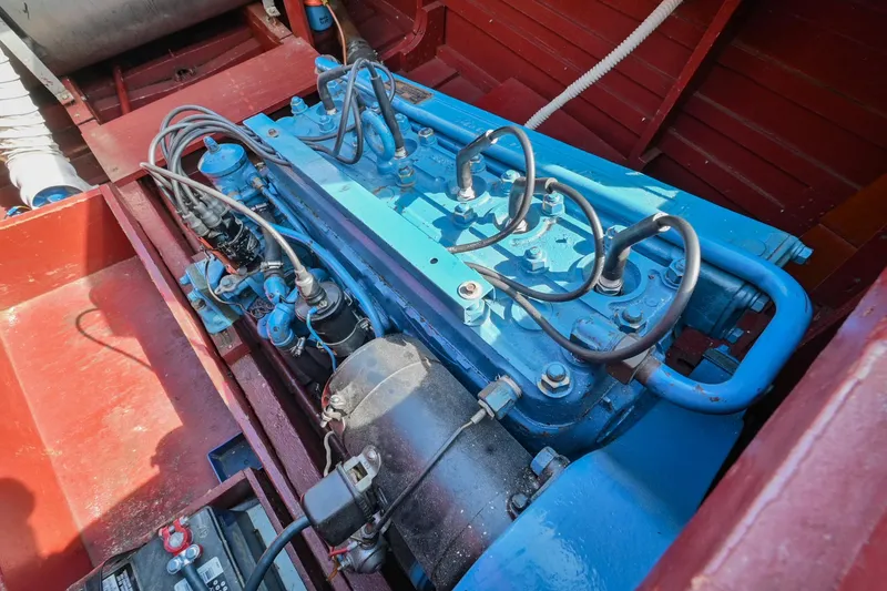 Slide: The Image of 1942 Chris-Craft 17 boat engine in red and blue. - 28