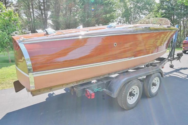 Slide: The Image of 1942 Chris-Craft 17 wooden boat on a trailer, side view. - 5
