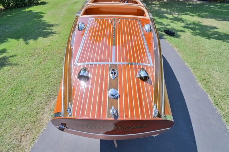 Slide: The Image of 1942 Chris-Craft 17 wooden boat with polished deck on a sunny day. - 9
