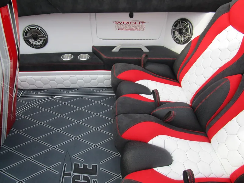 Slide: The Image of 2020 Wright Performance 360 interior with red and white seats, custom flooring, and premium audio system. - 12