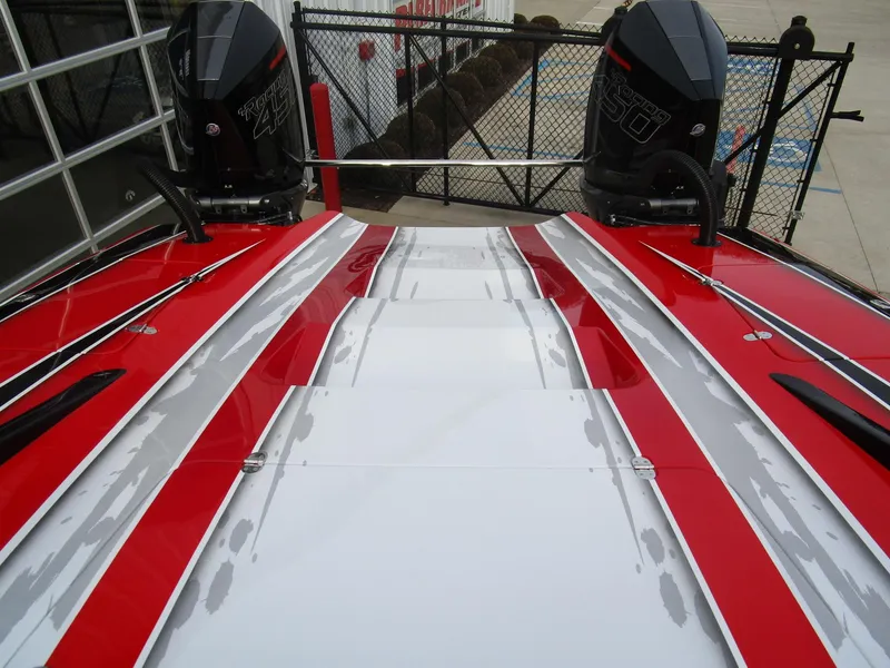 Slide: The Image of 2020 Wright Performance 360 boat with twin outboard engines, red and white design. - 13