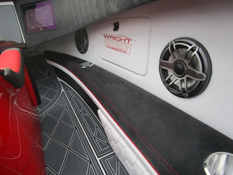 Slide: The Image of Interior of 2020 Wright Performance 360 boat with custom audio system and luxury seating. - 15