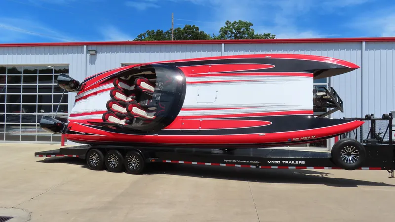 Slide: The Image of Wright Performance 360 boat on Myco trailer, 2020 model, red and black design. - 2