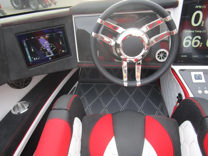 Slide: The Image of 2020 Wright Performance 360 boat cockpit with modern steering wheel and digital displays. - 21