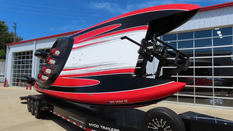 Slide: The Image of 2020 Wright Performance 360 boat on a Myco trailer outside a warehouse. - 3