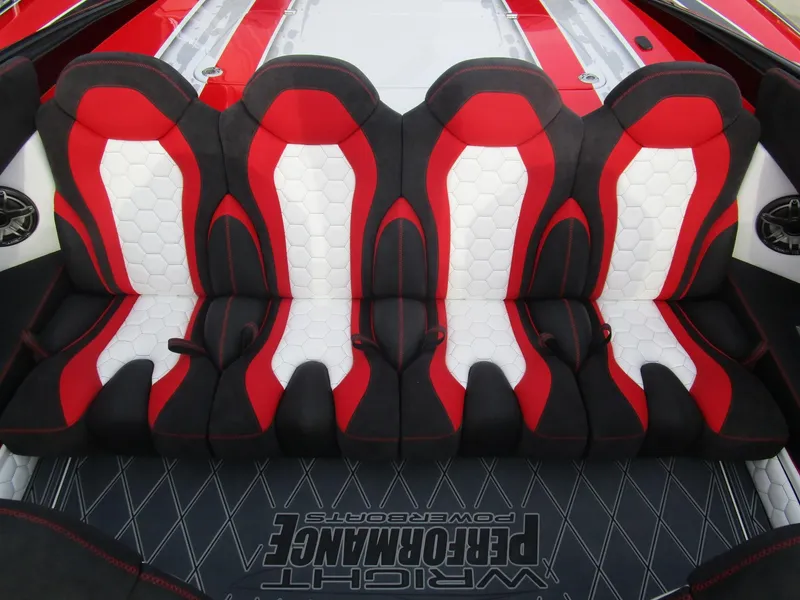 Slide: The Image of 2020 Wright Performance 360 boat interior with red, black, and white seats. - 31