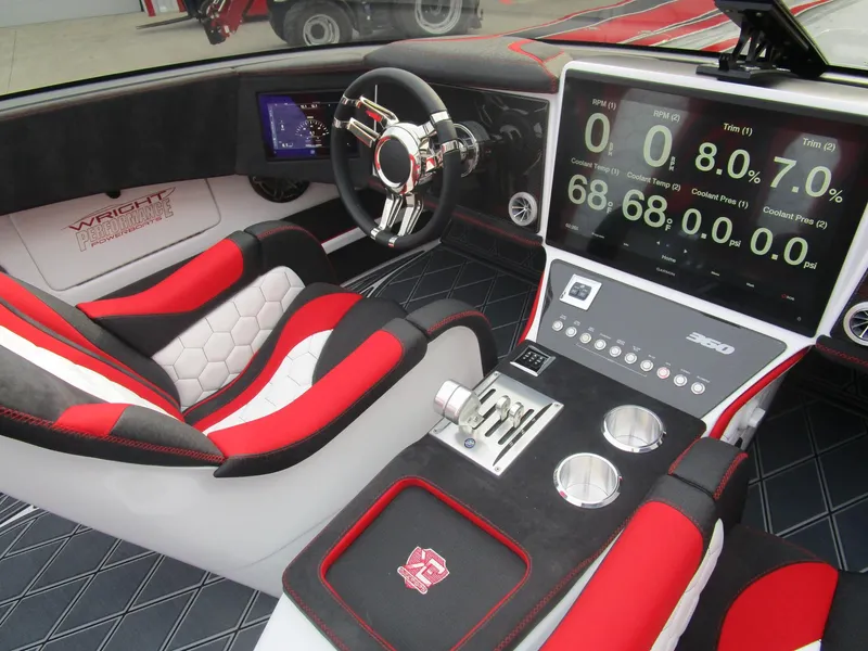 Slide: The Image of 2020 Wright Performance 360 boat interior with advanced dashboard and red-black seats. - 34