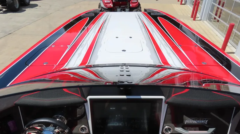 Slide: The Image of 2020 Wright Performance 360 boat with red, white, and black design. - 38