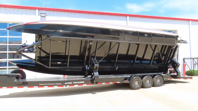 Slide: The Image of 2020 Wright Performance 360 boat on a trailer in front of a garage. - 4