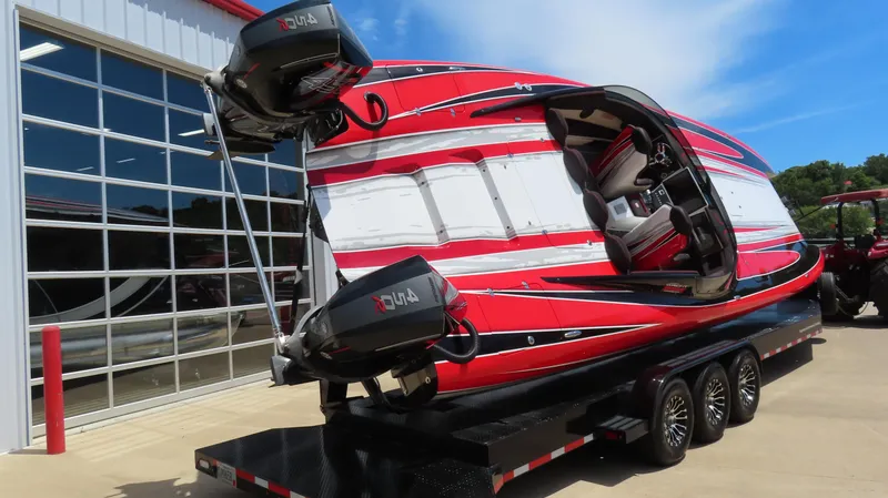 Slide: The Image of 2020 Wright Performance 360 boat on a trailer with dual outboard motors. - 7