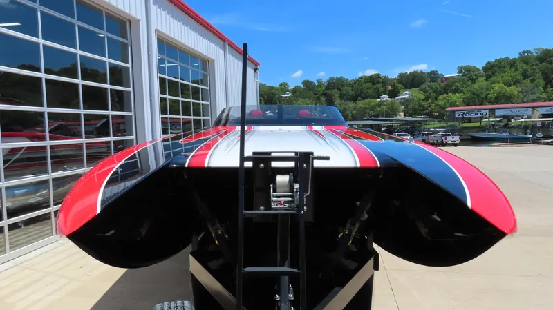 Slide: The Image of 2020 Wright Performance 360 powerboat in front of a marina building. - 9