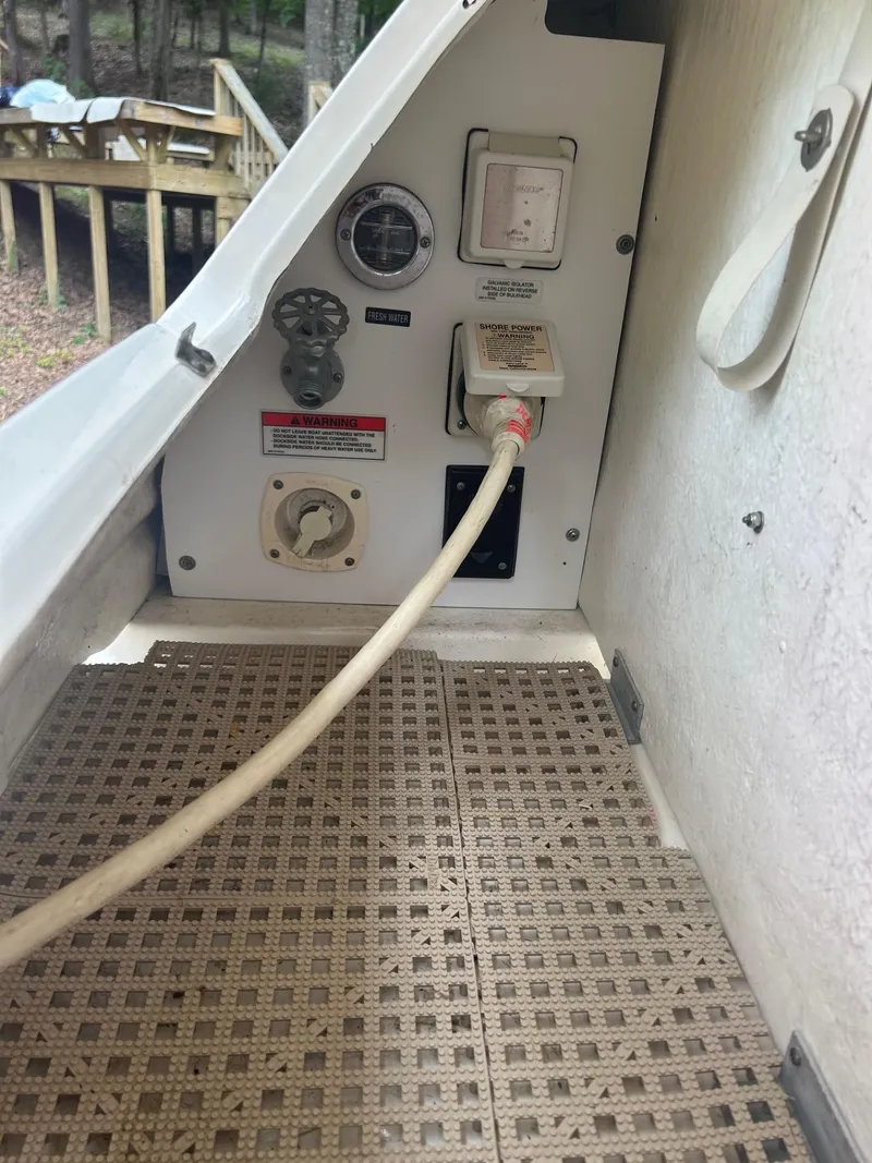 Slide: The Image of 2008 Sea Ray 280DA boat electrical panel with shore power connection. - 16