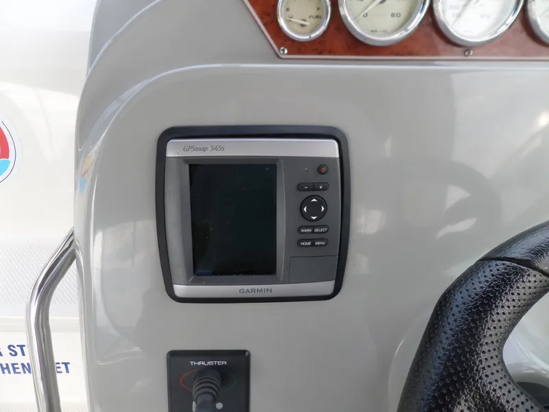 Slide: The Image of Garmin GPS display on 2008 Bayliner 320 Express boat dashboard. - 12