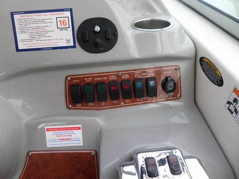 Slide: The Image of Control panel of a 2008 Bayliner 320 Express boat with labeled switches and emergency procedures. - 16