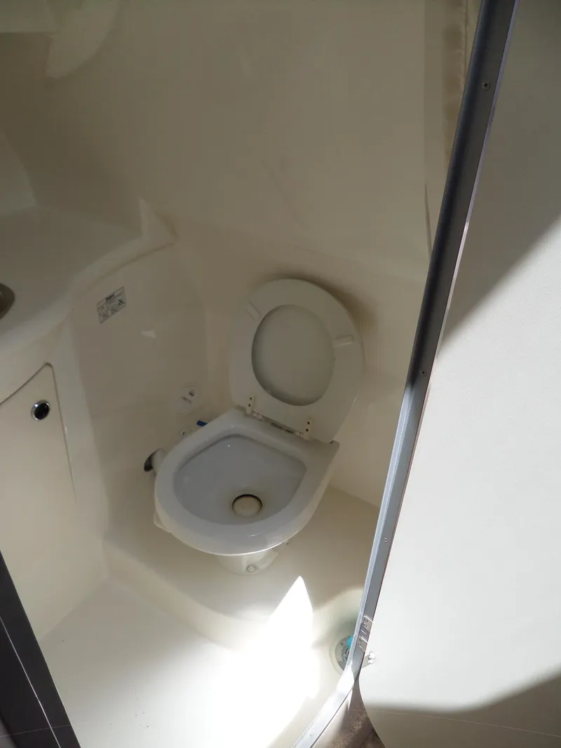 Slide: The Image of 2008 Bayliner 320 Express boat bathroom with toilet - 41