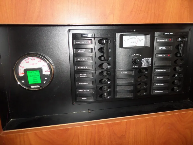Slide: The Image of Control panel of a 2008 Bayliner 320 Express boat. - 45