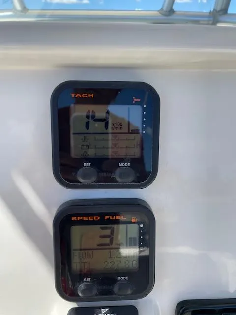 Slide: The Image of Close-up of 2015 Sailfish 220 boat tachometer and speed fuel gauges. - 16