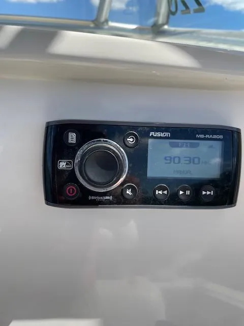 Slide: The Image of Fusion MS-RA205 marine stereo on 2015 Sailfish 220 boat dashboard. - 23