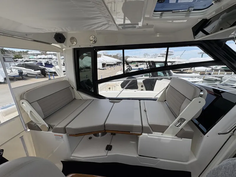 Slide: The Image of Interior of 2025 Boston Whaler 365 Conquest, featuring comfortable seating and modern design. - 15