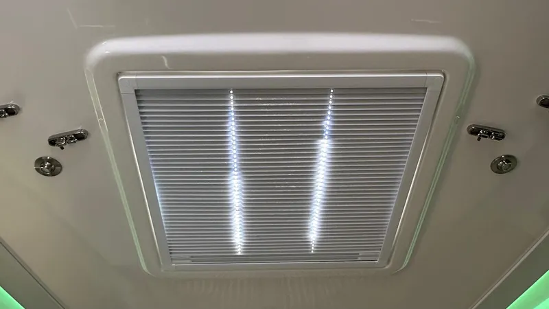 Slide: The Image of Ceiling vent on 2025 Boston Whaler 365 Conquest boat interior. - 37