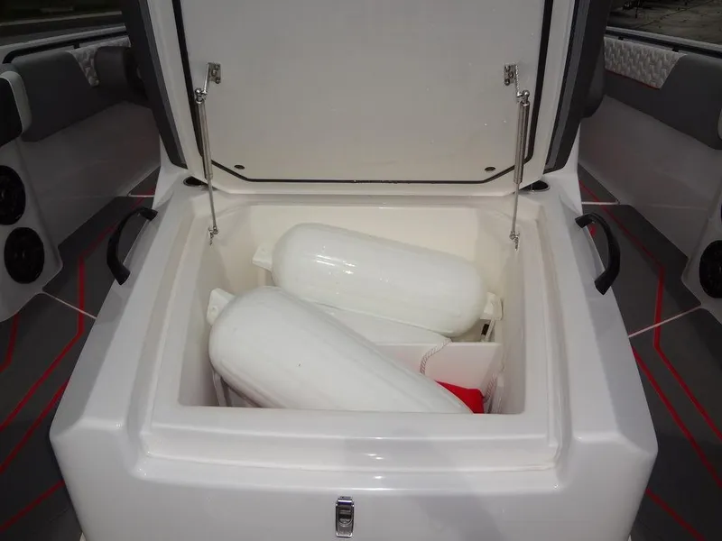 Slide: The Image of 2024 Fountain 32NX boat storage compartment with fenders. - 18