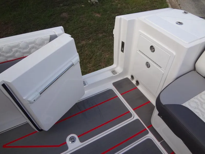 Slide: The Image of 2024 Fountain 32NX boat interior with storage compartments and seating. - 31