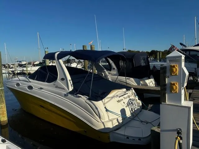 The Image of 2008 Sea Ray 280 Sundancer boat docked at marina under clear blue sky. - 0