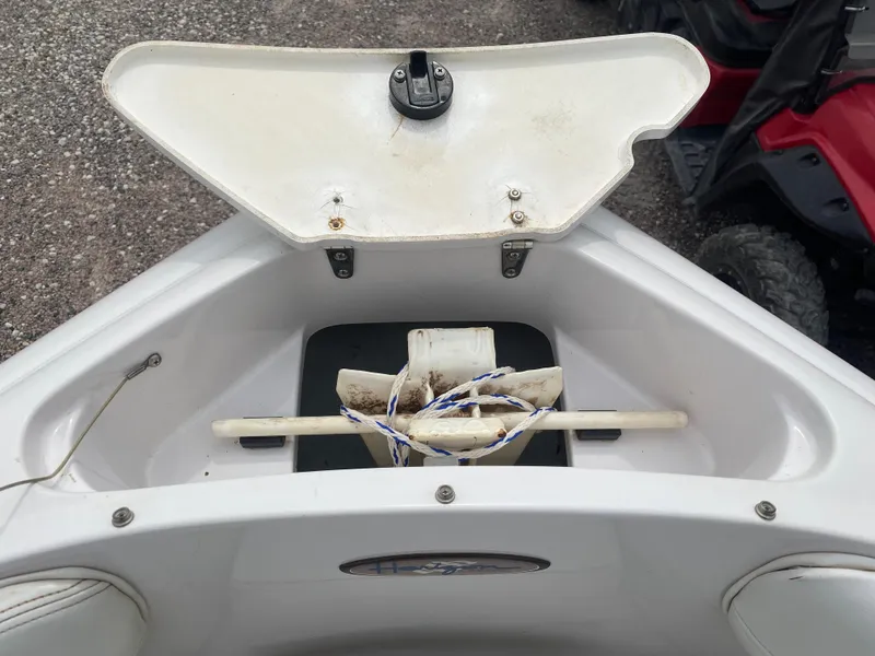 Slide: The Image of 1997 Four Winns 200 Horizon boat anchor storage compartment. - 5