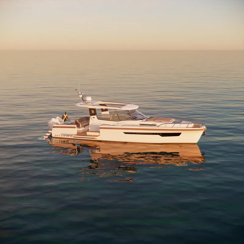 Slide: The Image of 2024 Nimbus W11 yacht cruising on calm waters at sunset. - 3