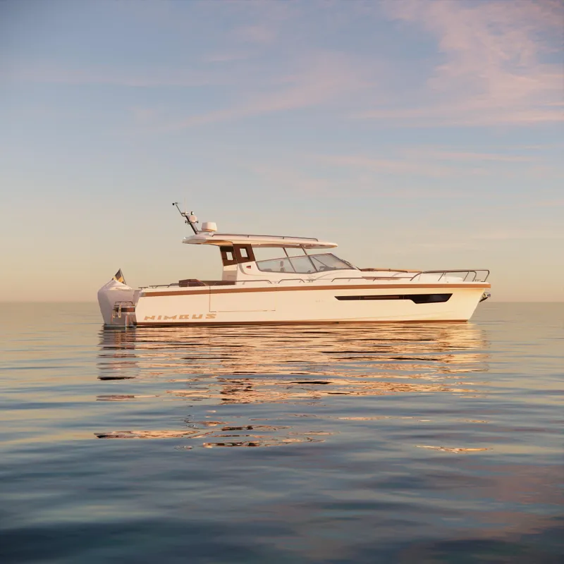 Slide: The Image of 2024 Nimbus W11 boat on calm water at sunset. - 6