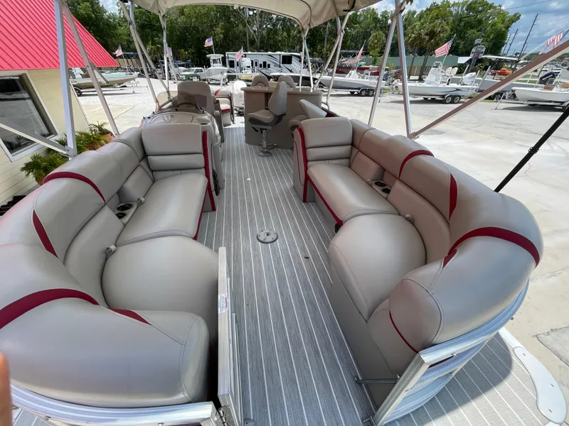Slide: The Image of 2018 Berkshire 250E STS pontoon boat with spacious seating and canopy. - 6
