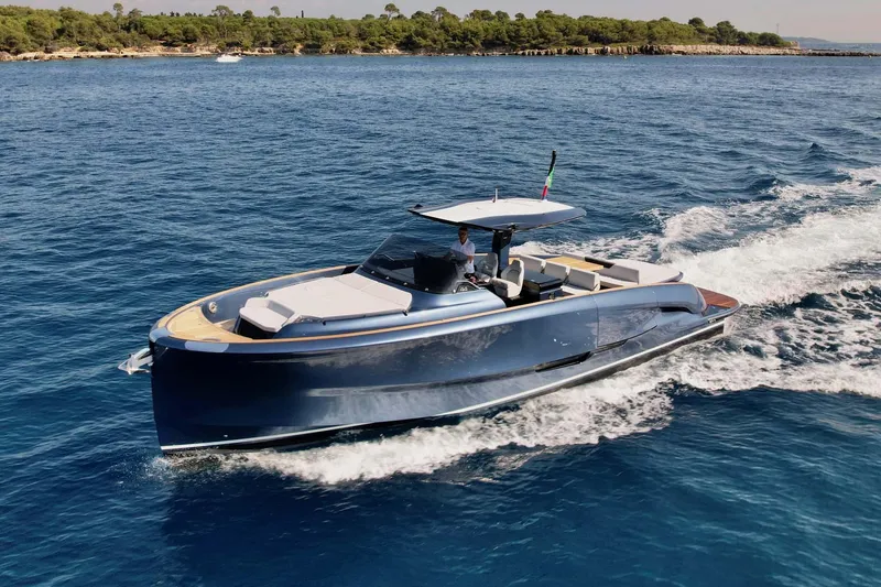 Slide: The Image of 2023 Solaris Power SP 44 yacht cruising on open water. - 1