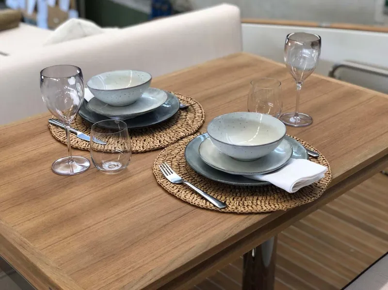 Slide: The Image of Elegant dining setup on Solaris Power SP 44 yacht, 2023 model. - 13