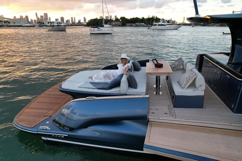 Slide: The Image of Luxury Solaris Power SP 44 yacht, 2023 model, with elegant deck and scenic waterfront view. - 14