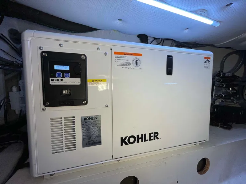 Slide: The Image of Kohler generator inside 2023 Solaris Power SP 44 yacht engine room. - 17