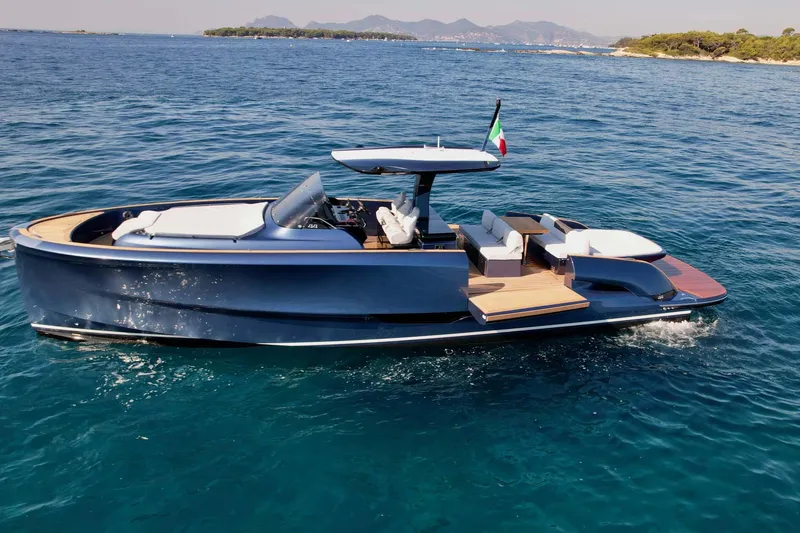 Slide: The Image of 2023 Solaris Power SP 44 yacht cruising on clear blue water. - 18