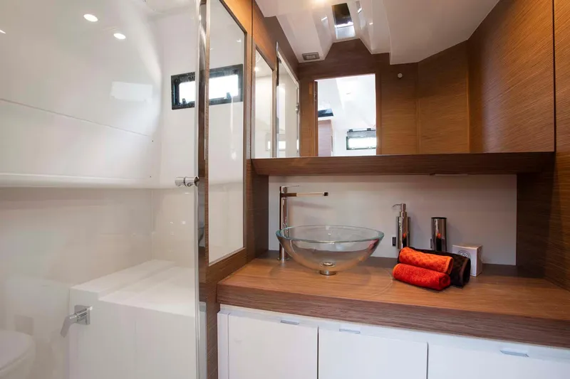 Slide: The Image of Luxurious bathroom in 2023 Solaris Power SP 44 yacht with modern glass sink. - 4
