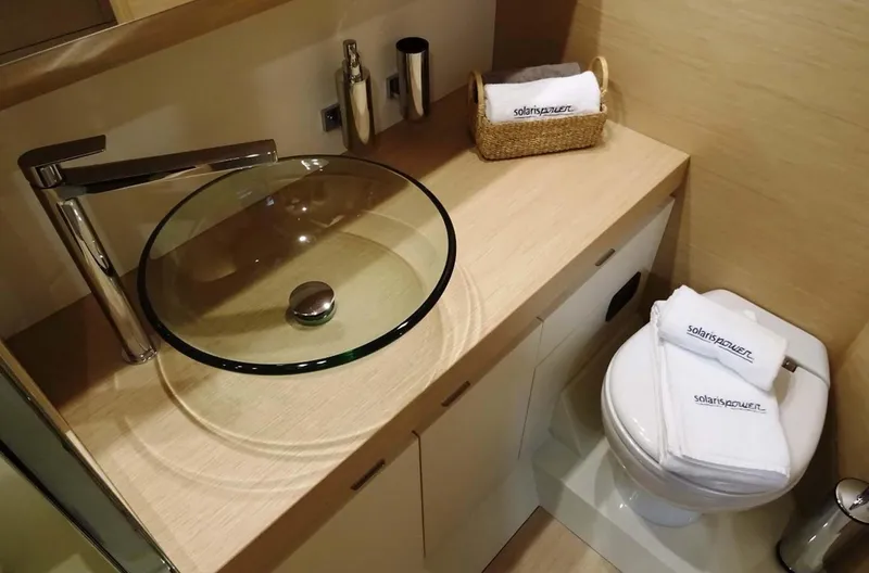 Slide: The Image of Luxurious bathroom in 2023 Solaris Power SP 44 yacht with glass sink and modern fixtures. - 5