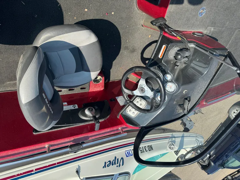 Slide: The Image of 2015 Nitro ZV 18 boat cockpit with steering wheel and seat. - 5